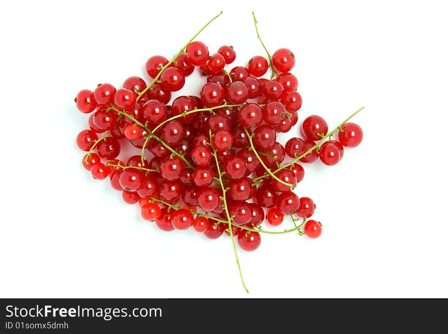 The heap of red currant on white