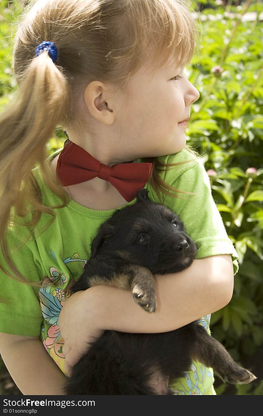 Girl with puppy