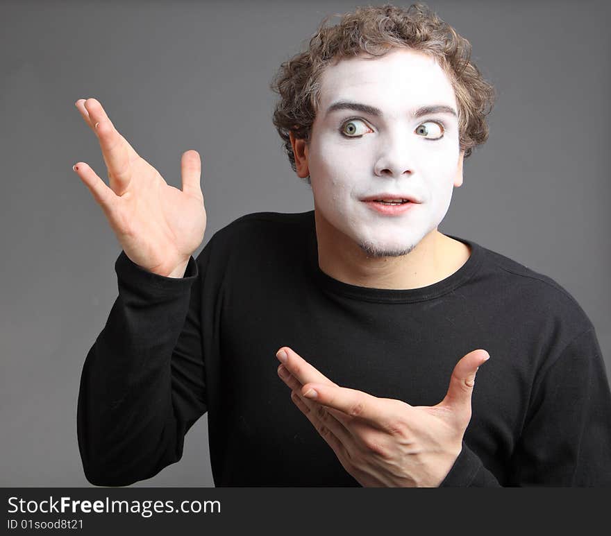 Portrait of the mime isolated on grey background