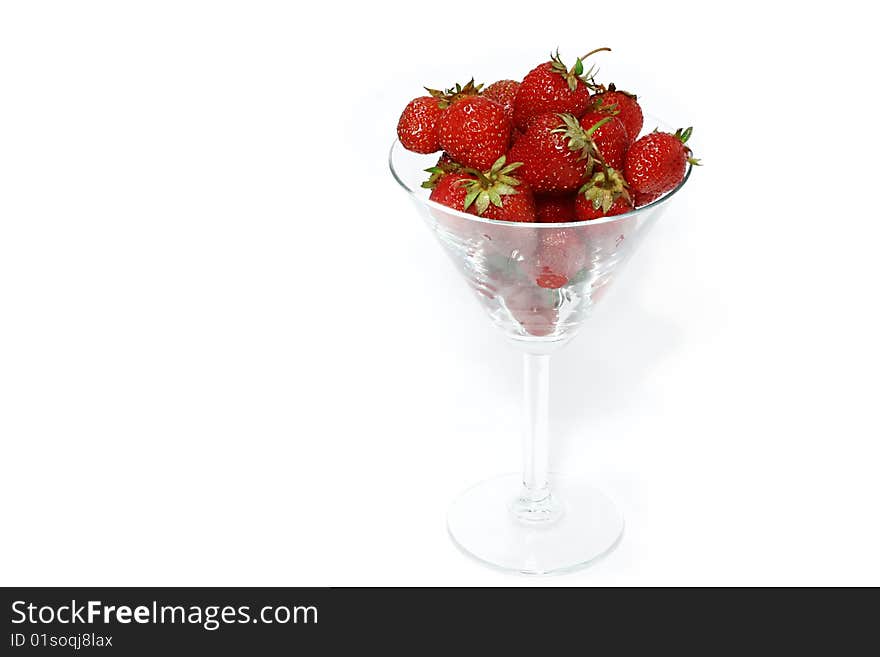 Strawberry in the glass isolated on a white