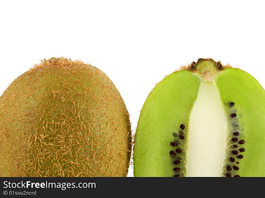 A vertically sliced kiwi fruit isolated on a white background