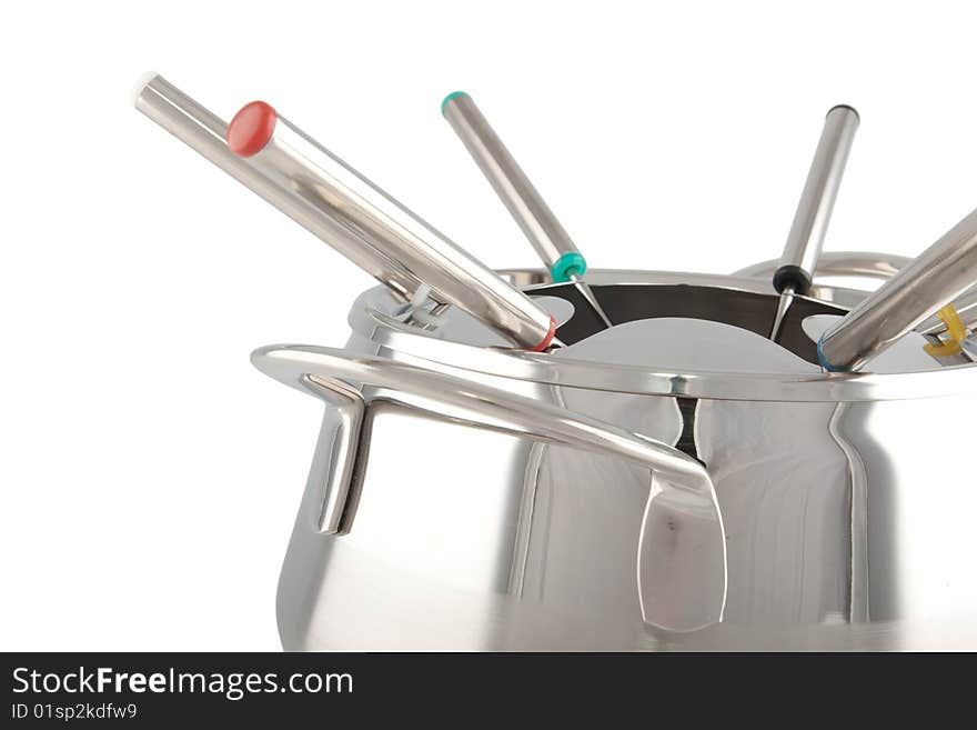 Close-up of a stainless steel fondue maker