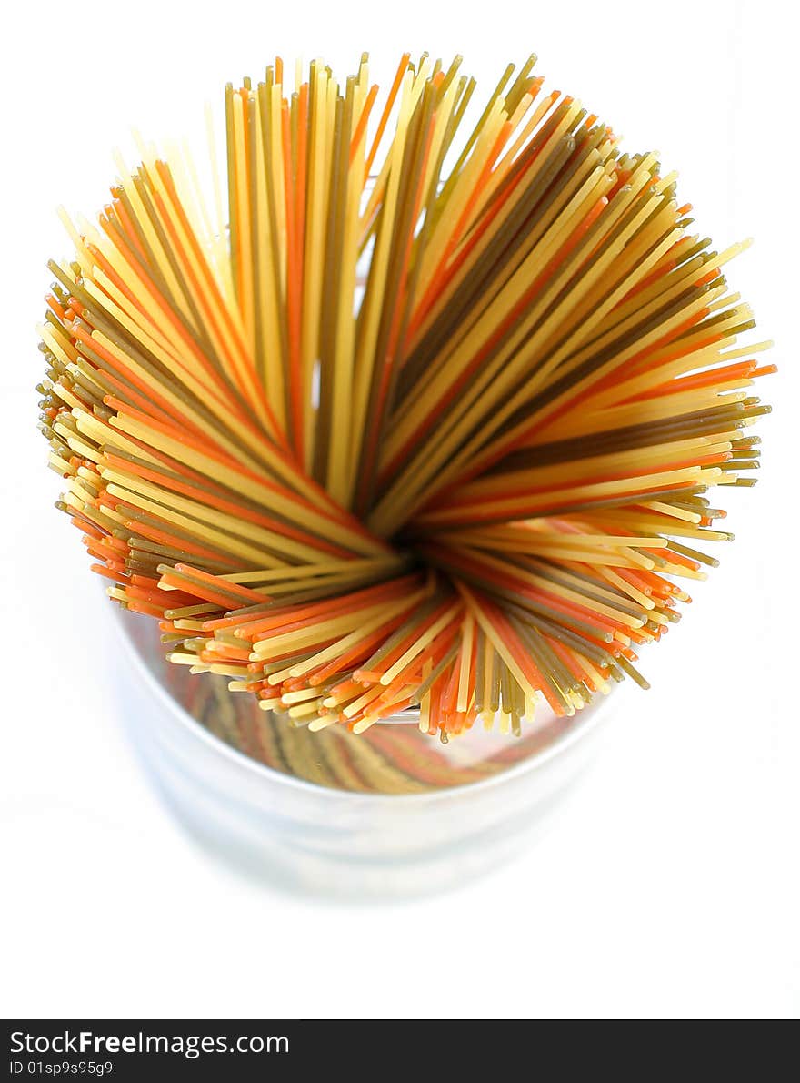 Colored raw spaghetti from upside