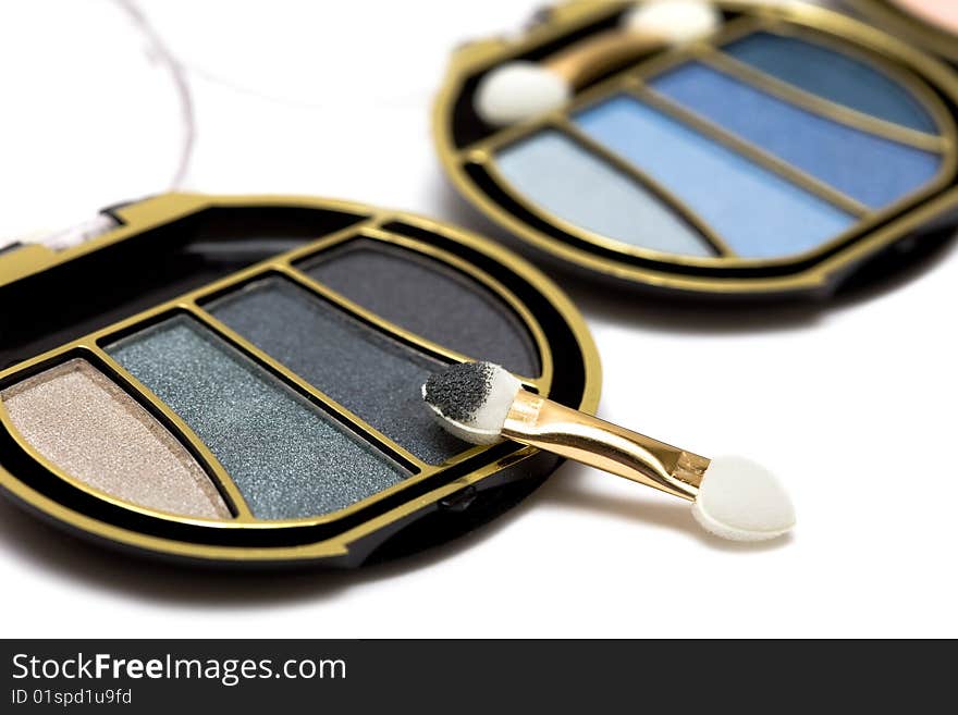 Blue and black make-up eyeshadows