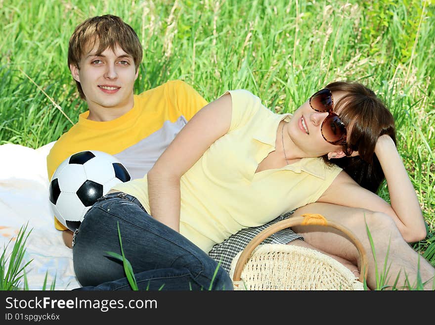 Beautiful couple having a rest outdoor. Beautiful couple having a rest outdoor.