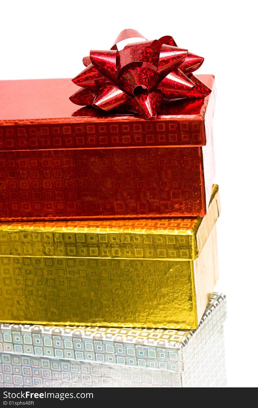 Varicoloured gift boxes with bow