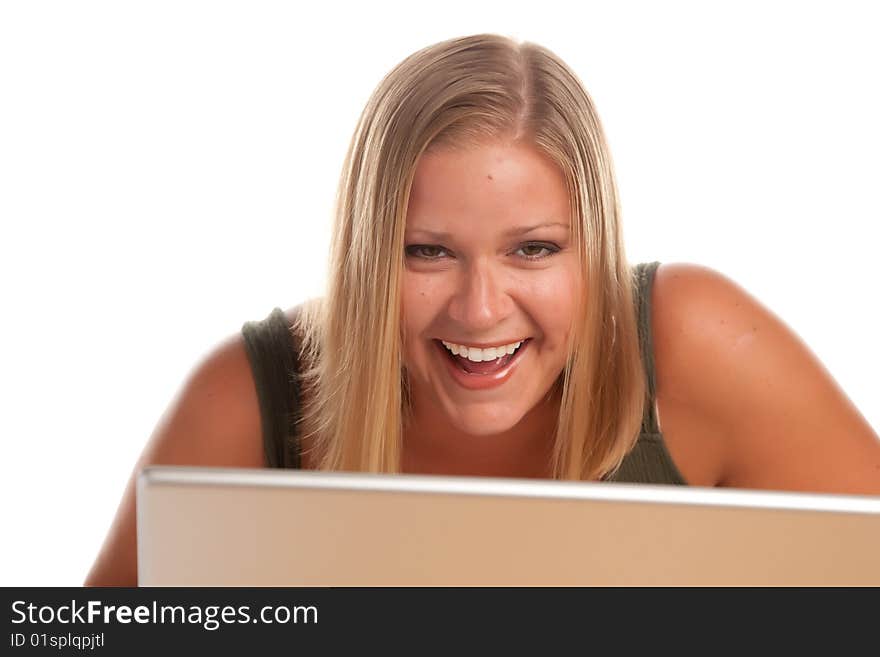 Smiling Beautiful Blonde Woman Using A Laptop. Smiling Beautiful Blonde Woman Using A Laptop.