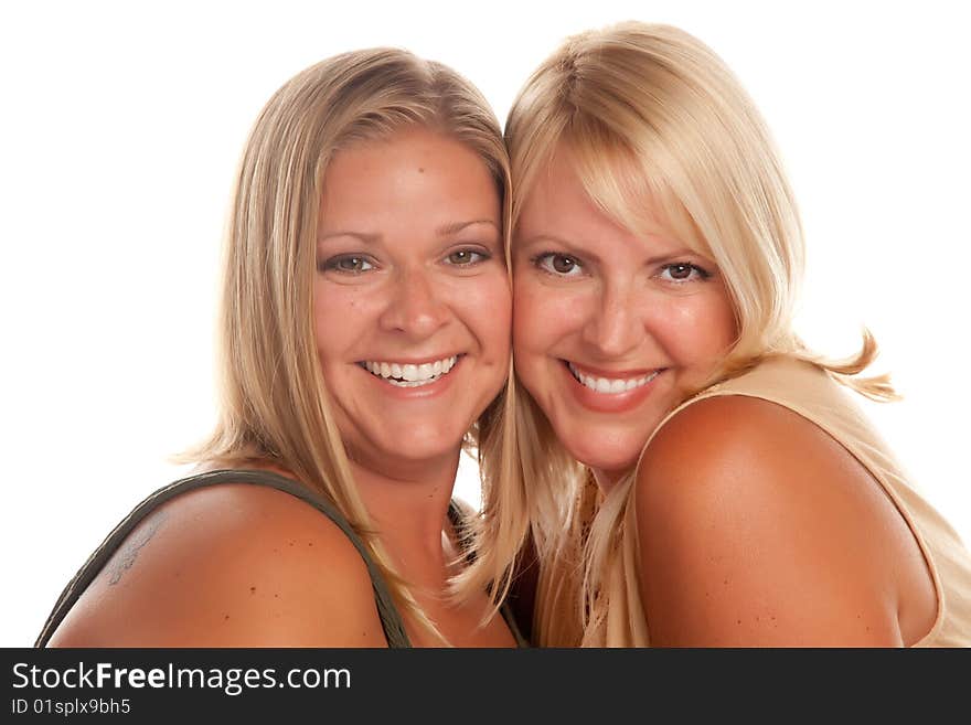 Two Beautiful Smiling Sisters Portrait Isolated on a White Background.