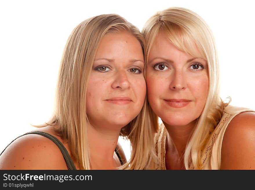 Two Beautiful Sisters Portrait Isolated on a White Background.