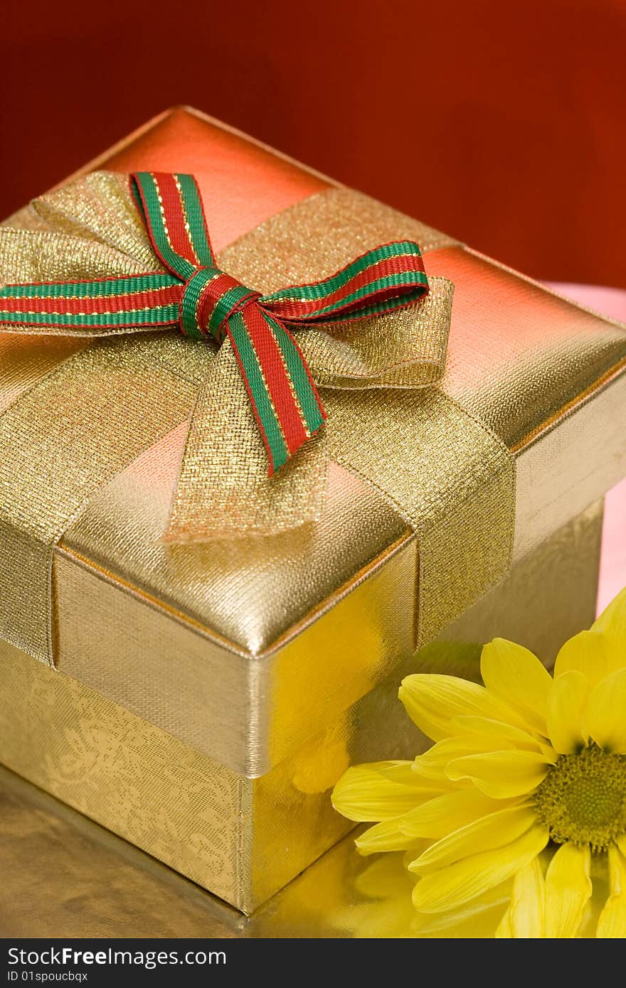 Gift box with yellow flower