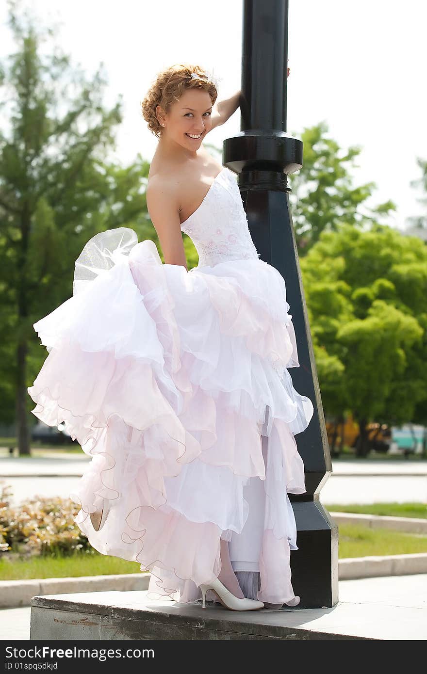 Young attractive woman in a wedding dress. Young attractive woman in a wedding dress