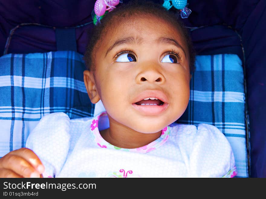 An adorable little African American Girl with Braids. An adorable little African American Girl with Braids