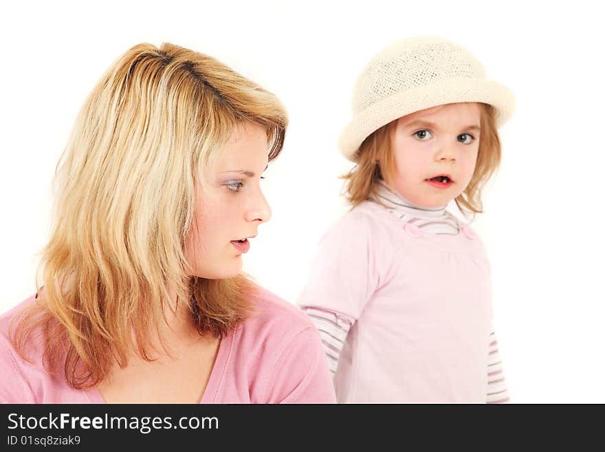 Portrait of young mother and daughter, studio shot