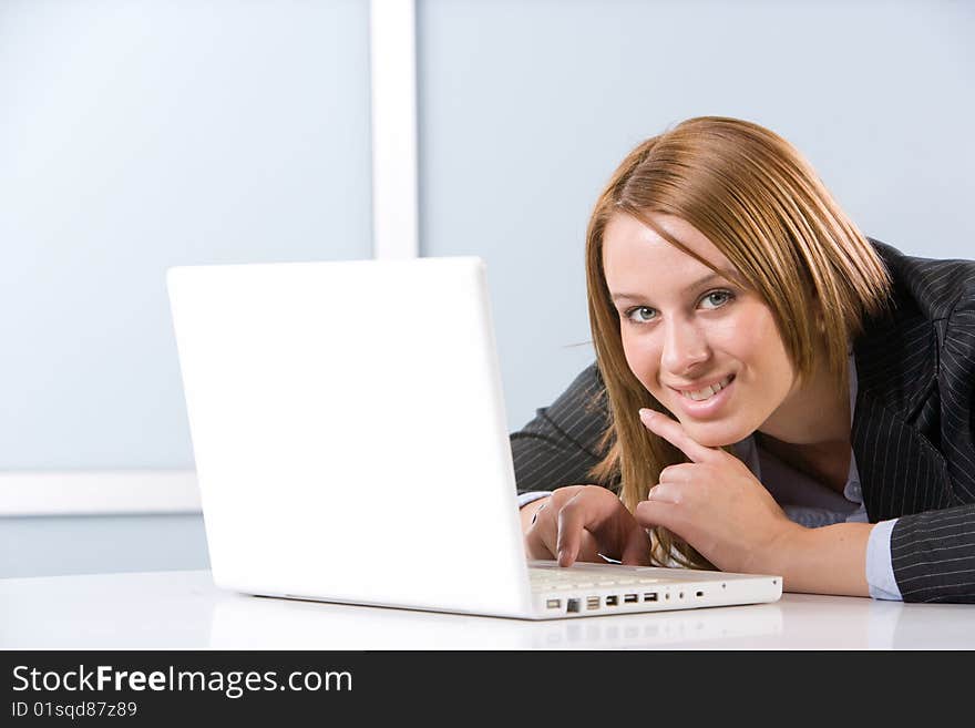 Business woman laptop in modern office