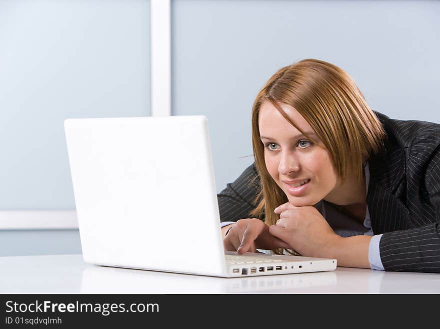 Business woman laptop in modern office