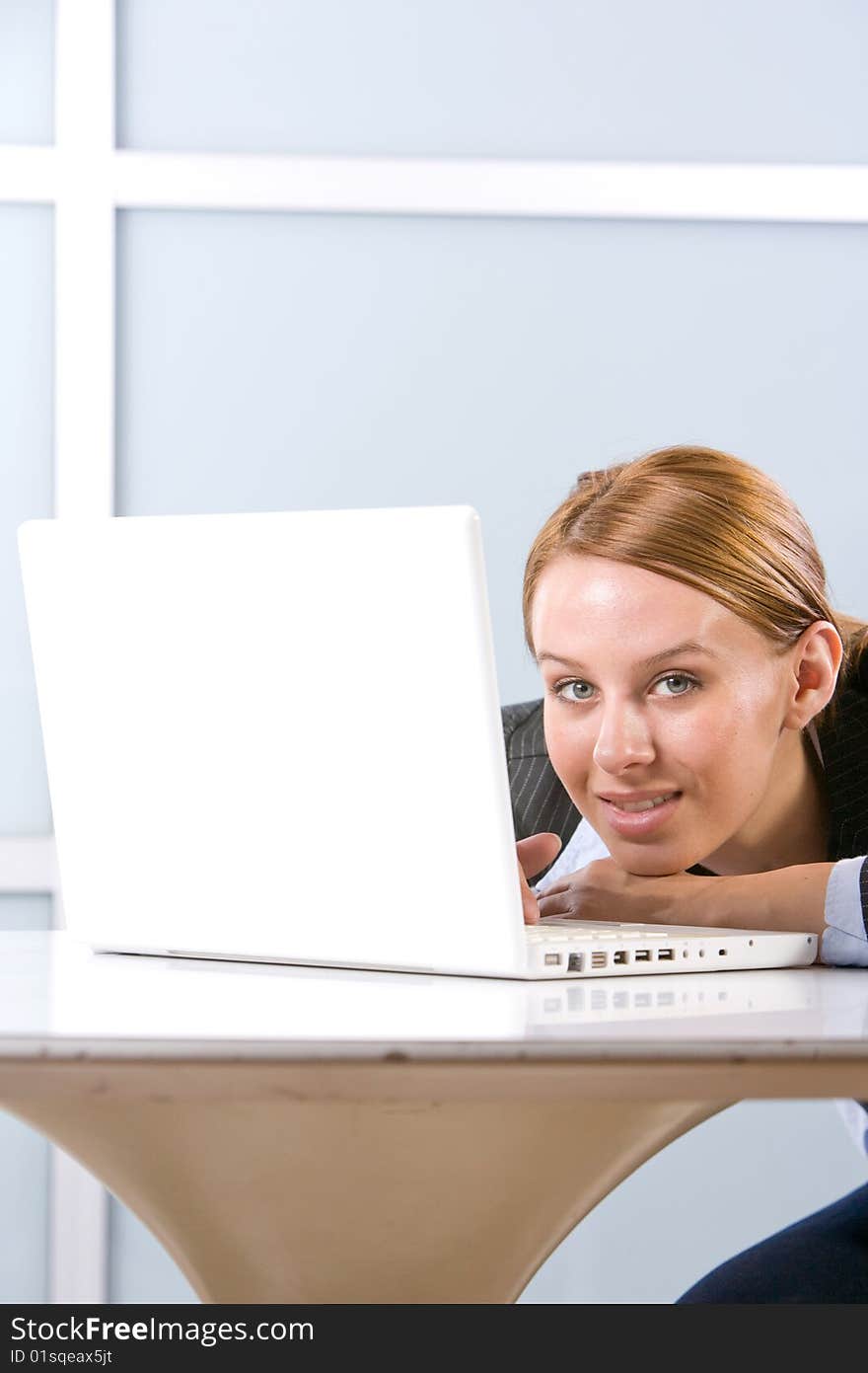 Business woman laptop in modern office