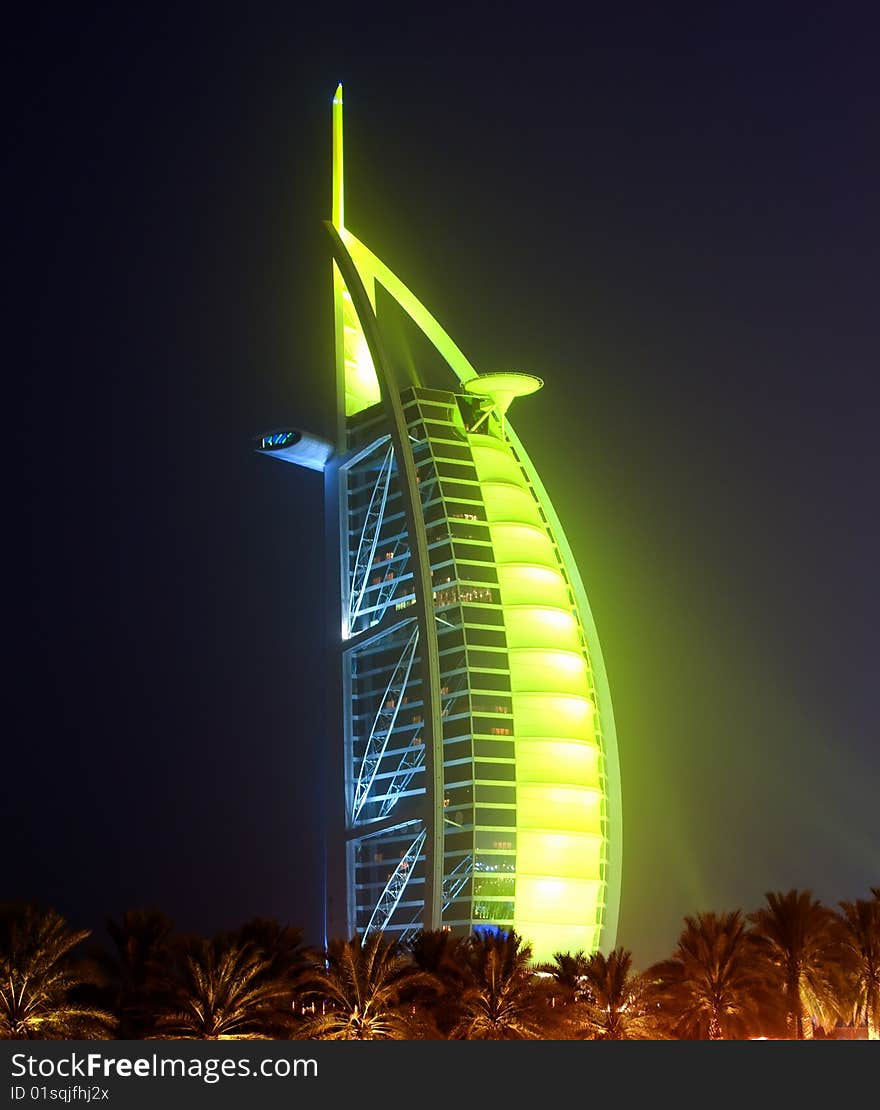 Burj Al Arab glowing at night in Green