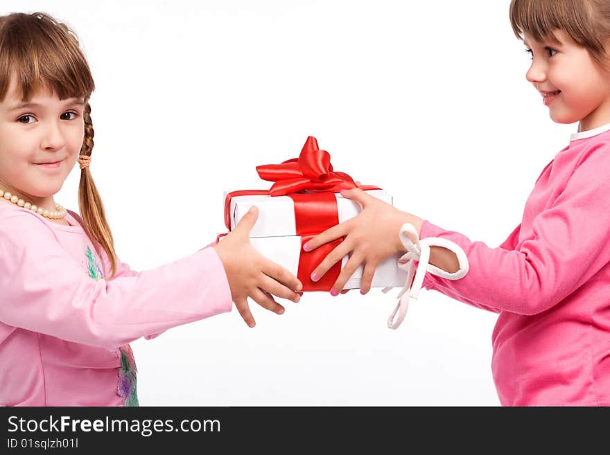 Little girls holding gift boxes