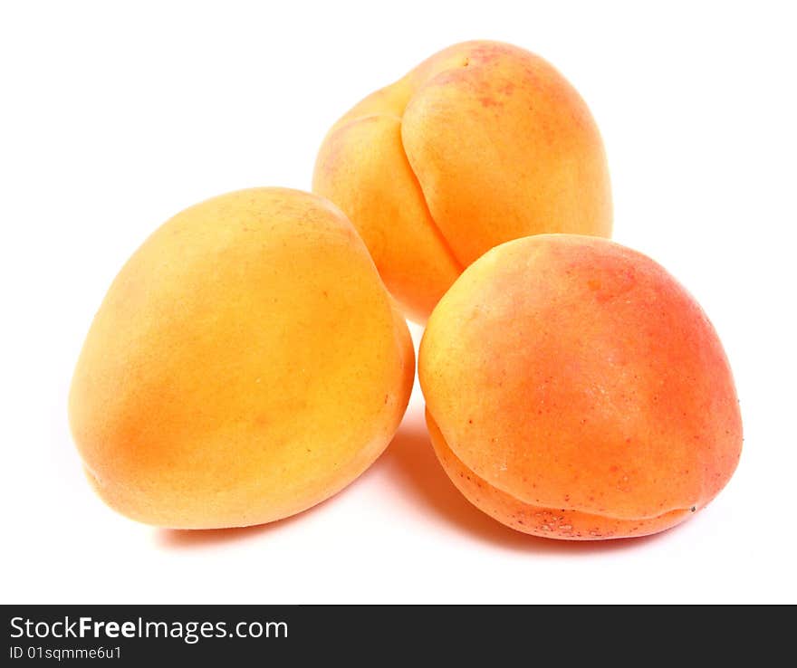 Apricots isolated on a white background