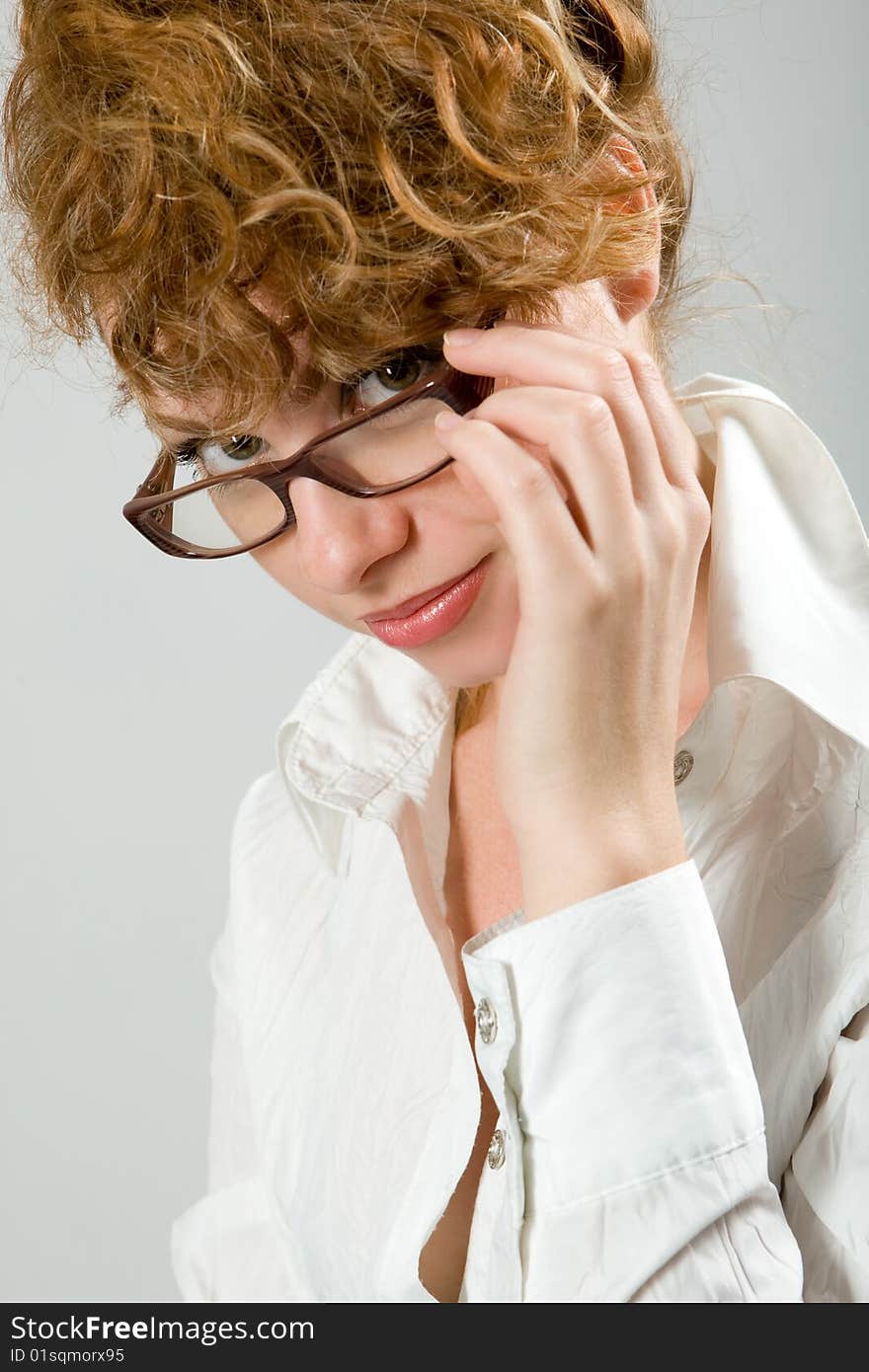 Pretty thoughtful girl with eyeglasses. Pretty thoughtful girl with eyeglasses