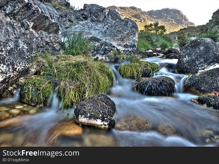 Stream with a waterfall in motion. Stream with a waterfall in motion