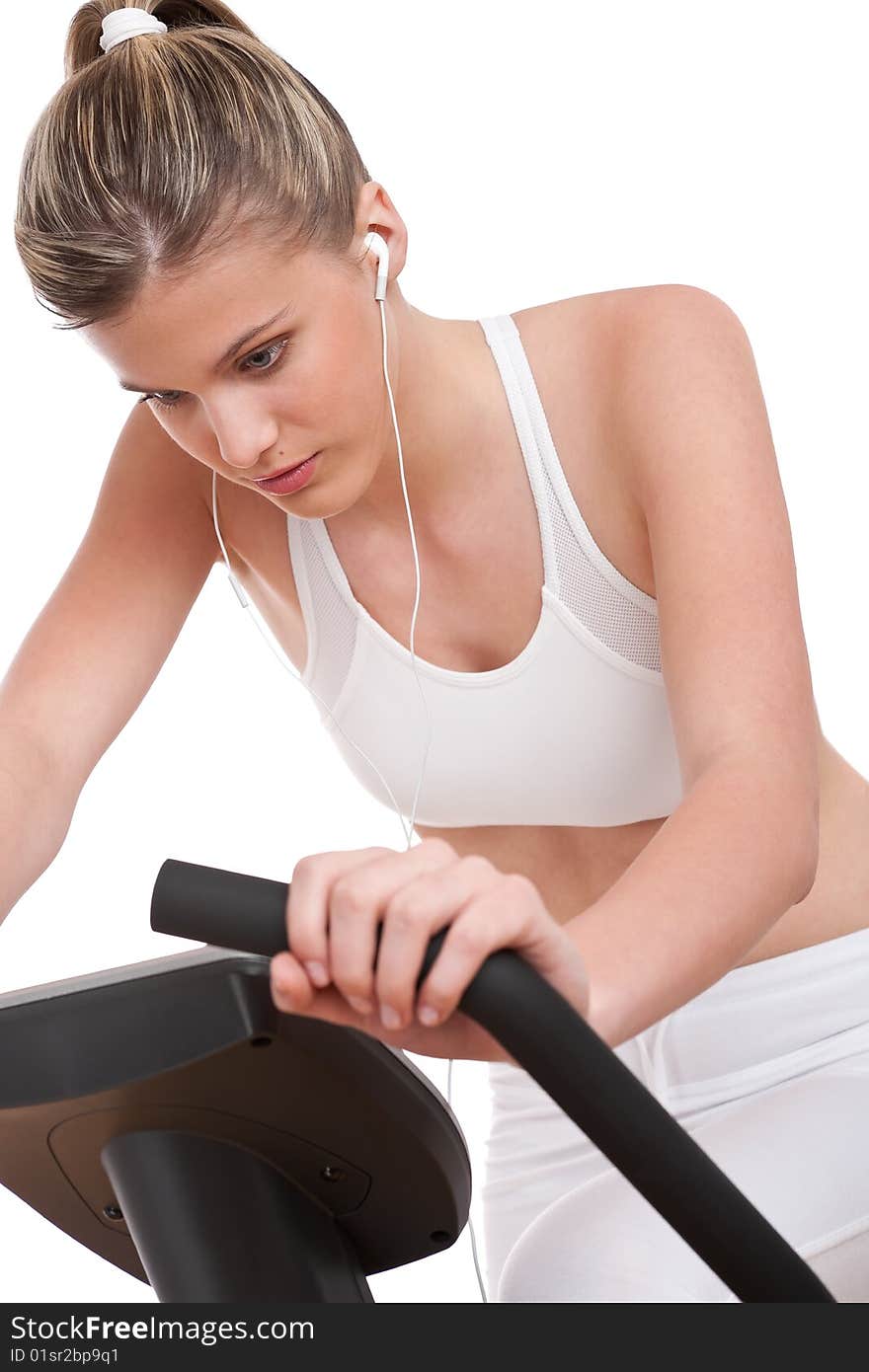 Fitness series - Woman with headphones training on white background. Fitness series - Woman with headphones training on white background