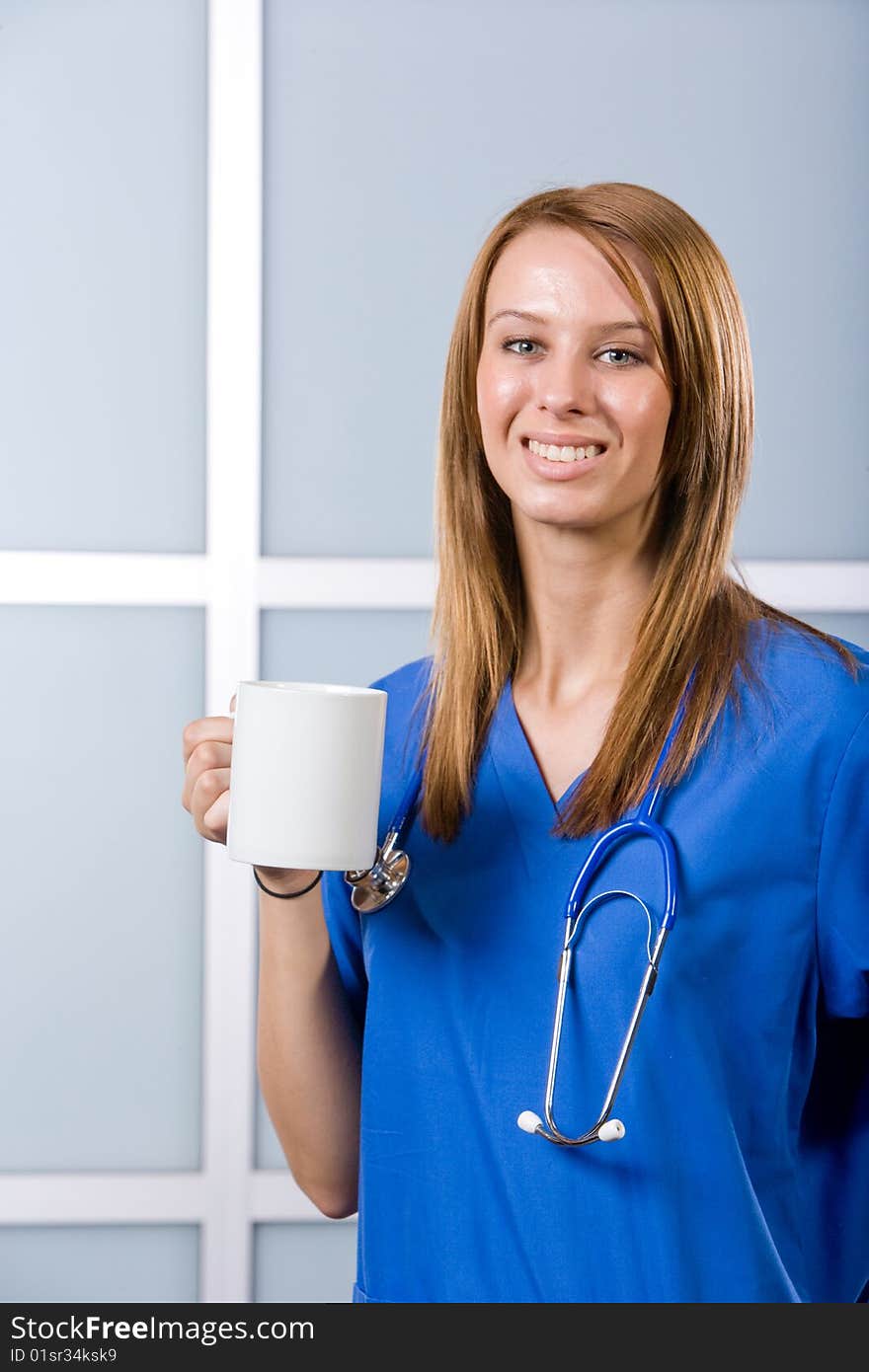 Female Nurse portrait in a modern Hospital