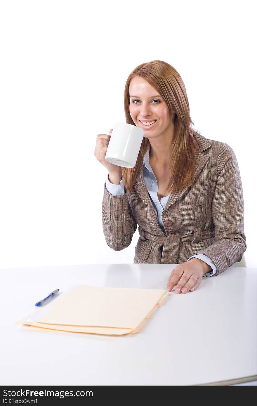 Business woman drinking coffee isolated on white