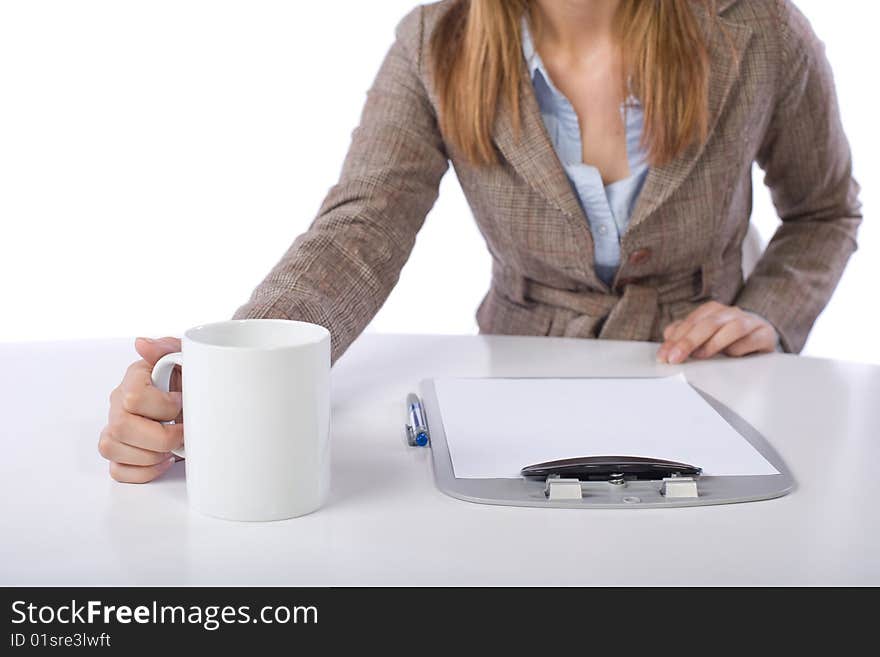 Business woman drinking coffee isolated on white