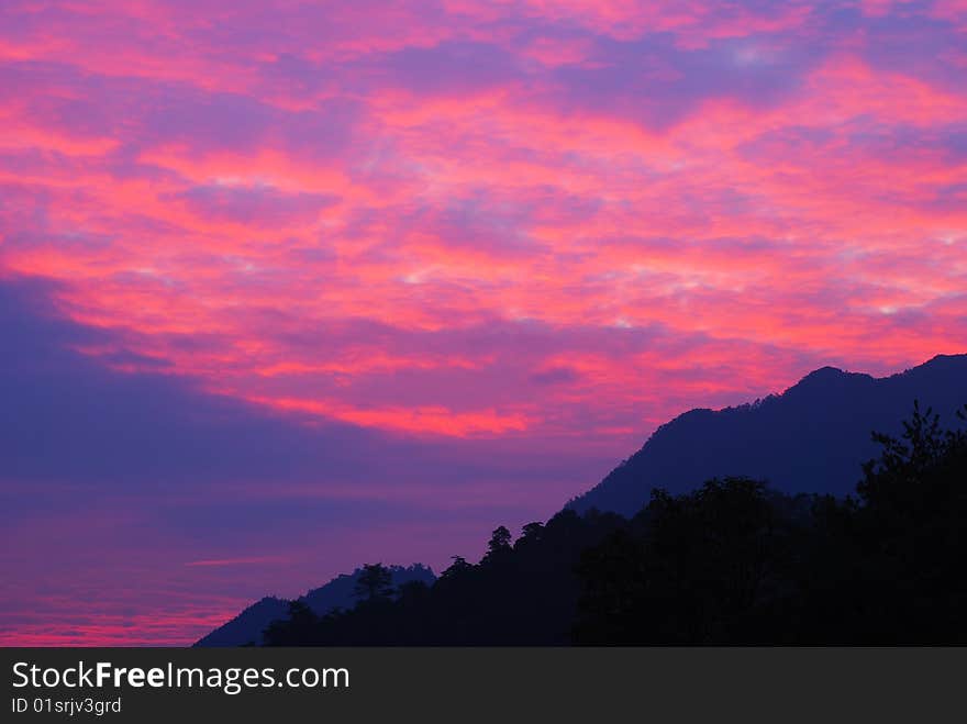 Chinese Guangdong first peak rosy-colored clouds at dawn. Chinese Guangdong first peak rosy-colored clouds at dawn.