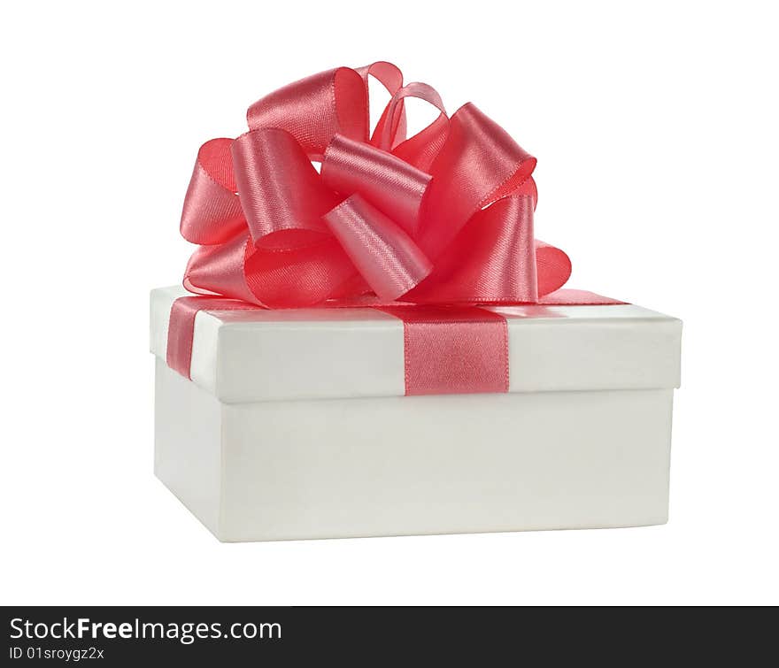 White box with pink satin ribbon bow on white background. White box with pink satin ribbon bow on white background