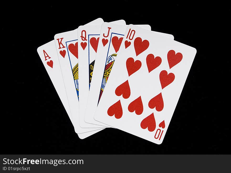 Straight Flush poker hand shot on blackbackground