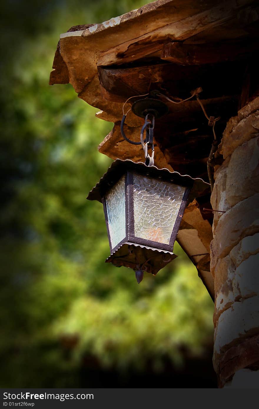Old street lamp on natural background.