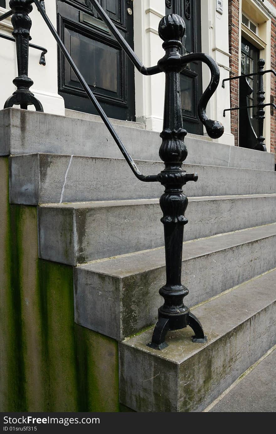 Typical dutch entrance along the canals in Amsterdam The Netherlands