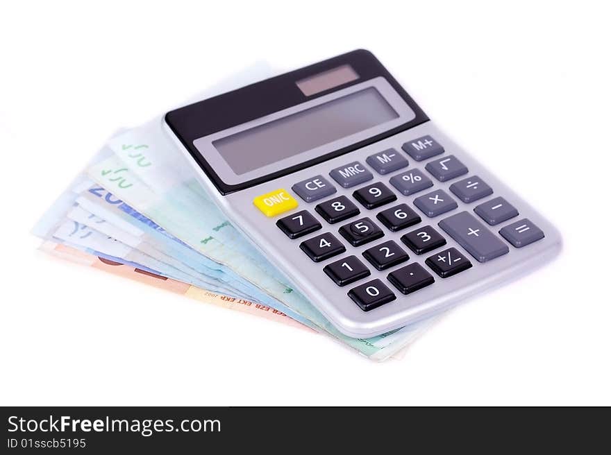 Calculator on banknotes isolated on white background