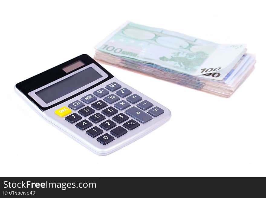 Closed up  calculator and stack of banknotes isolated on white background. Closed up  calculator and stack of banknotes isolated on white background