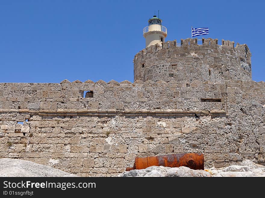 Lighthouse at harbour in Rhodes, Greece