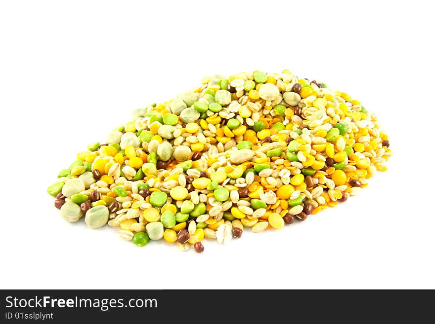 Assorted soup pulses in a heap on a white background