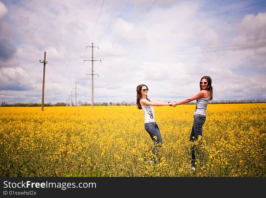 Women having fun in the field