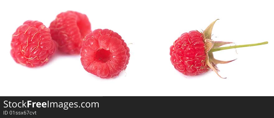 Red ripe raspberry on white background