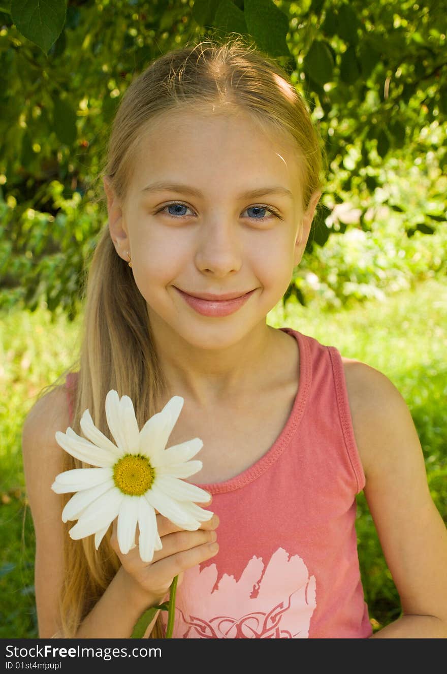 Smiling girl teenager with flower. Smiling girl teenager with flower