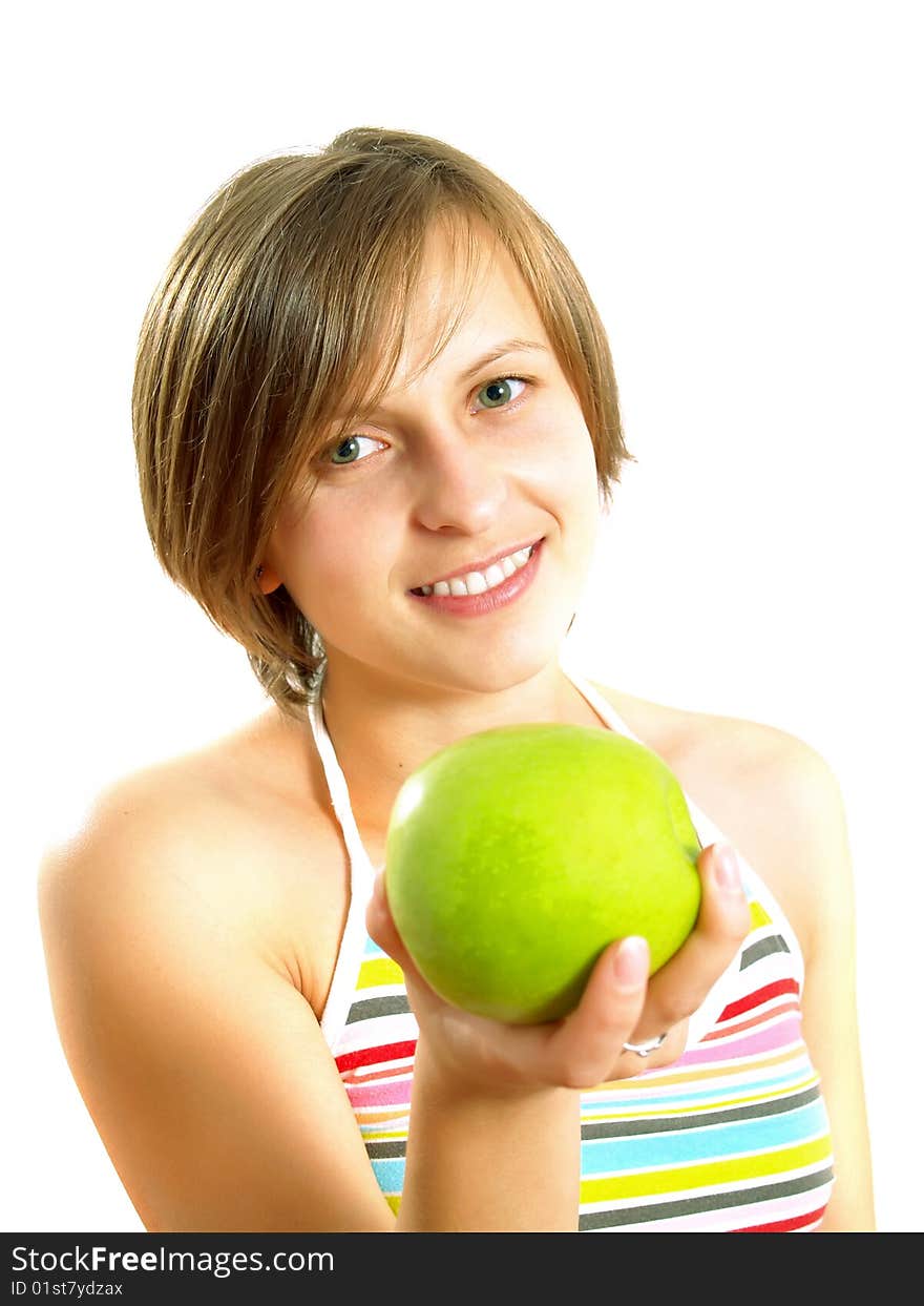 Smiling young lady with a green apple