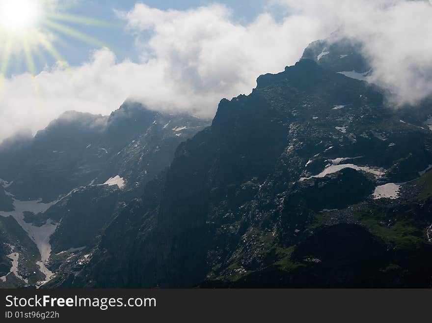 Mountain tops in clouds