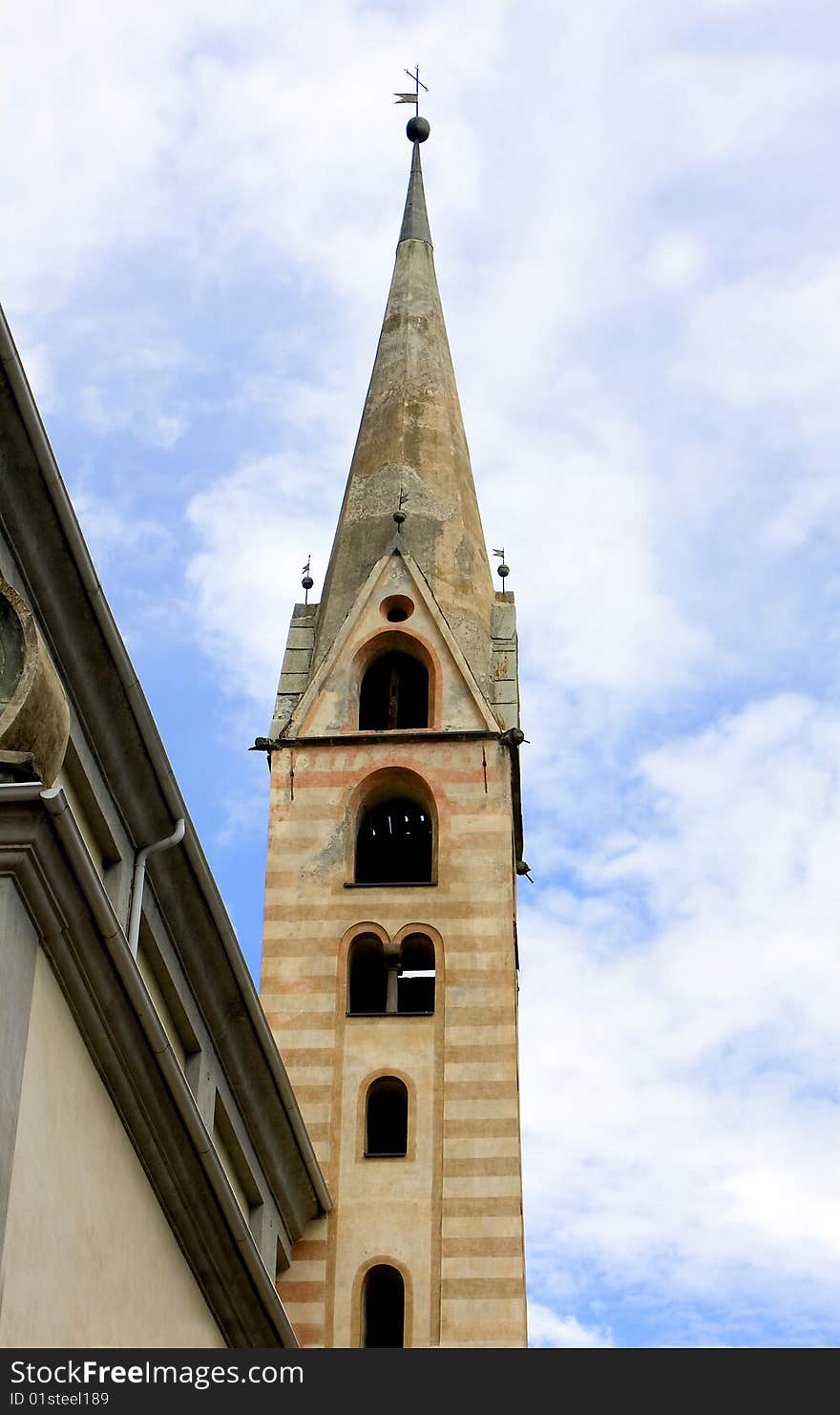 Church with a bell tower and cloudy