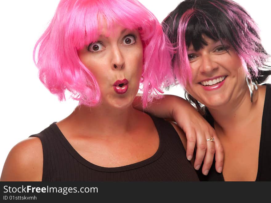 Portrait of Two Pink And Black Haired Smiling Girls Isolated on a White Background.