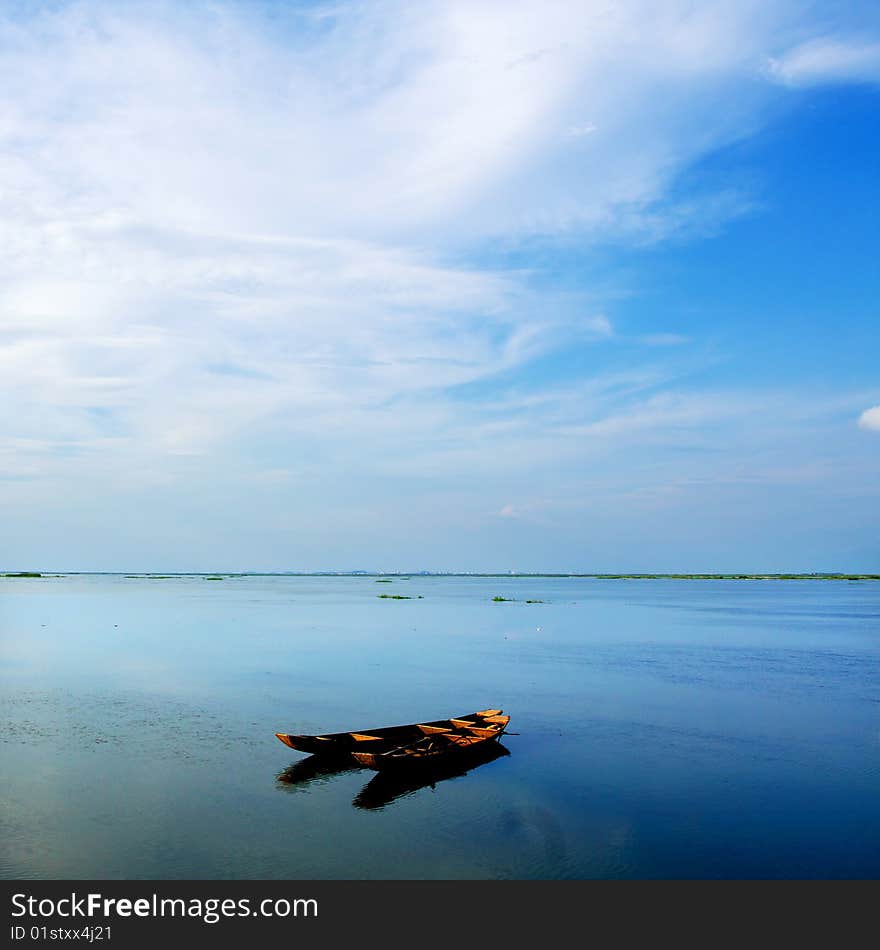 Two fishers on the lake