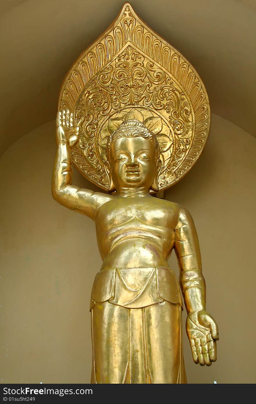 Golden icon on exterior of Buddhist shrine in Darjeeling, West Bengal, India, Asia