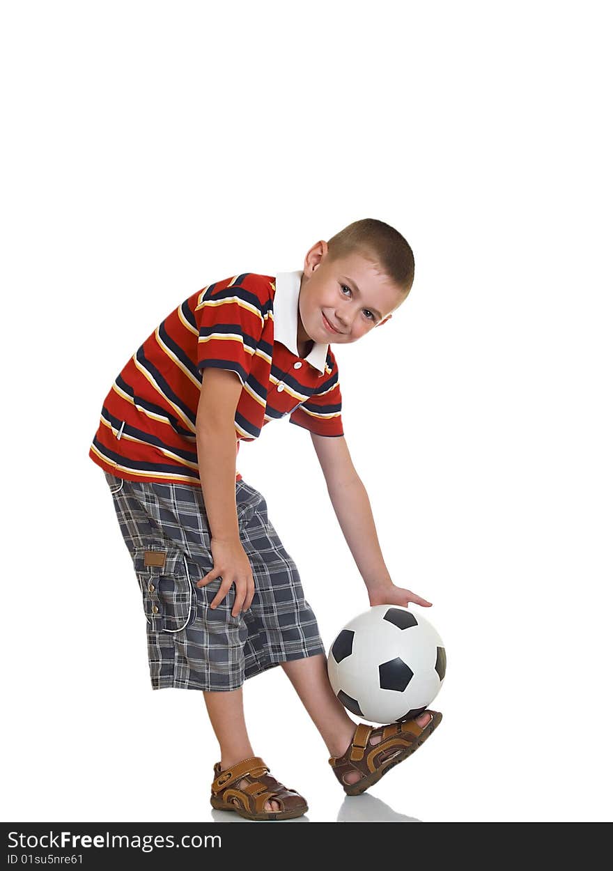 Young boy holding football in his hand. Young boy holding football in his hand