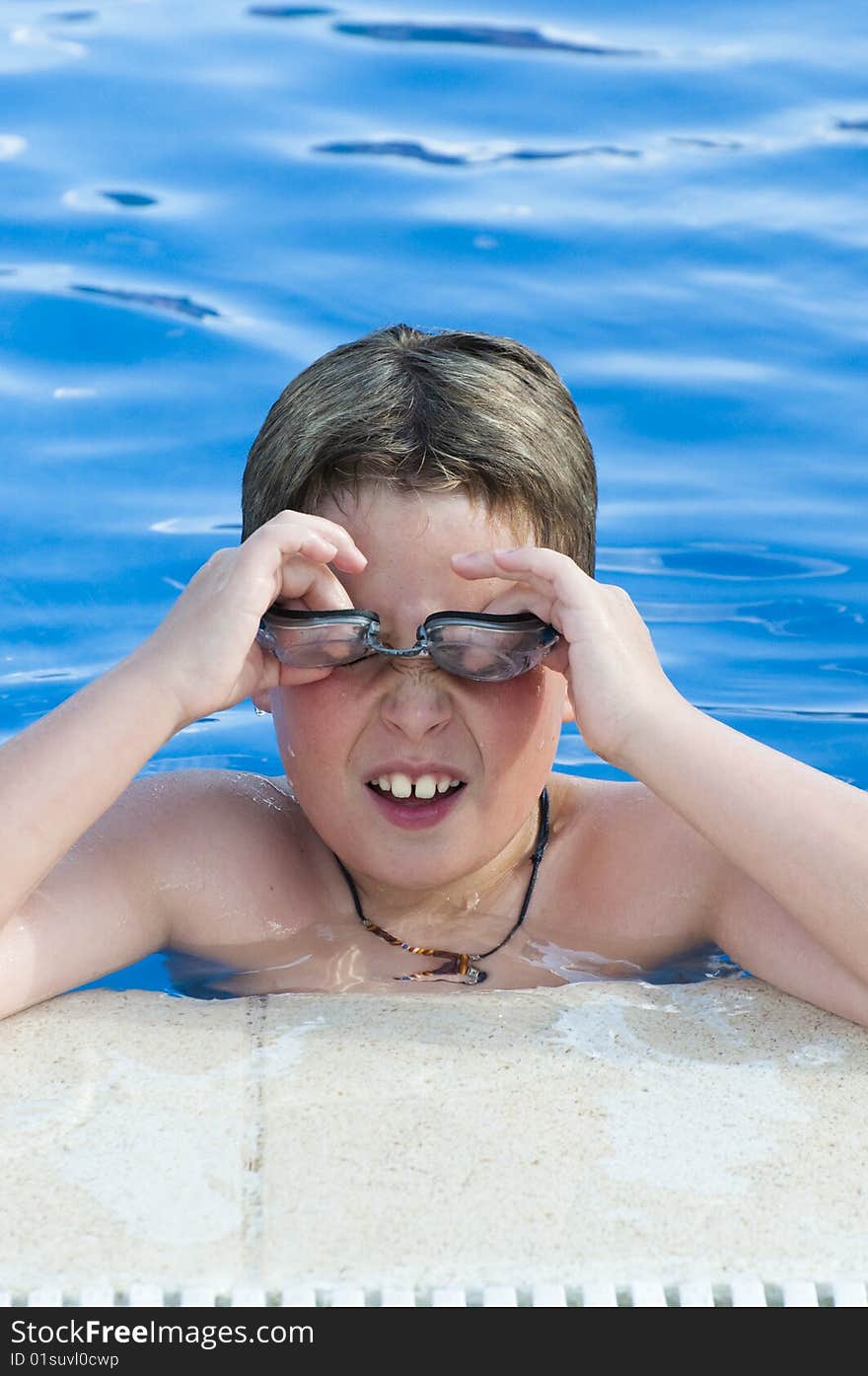 Picture of a boy on a swimming pool