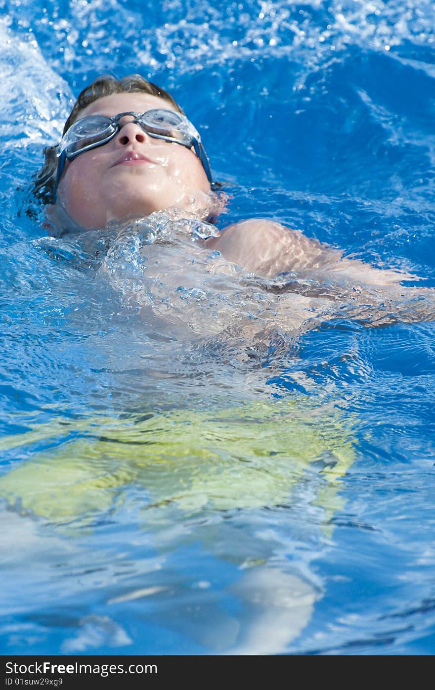 Picture of a boy on a swimming pool